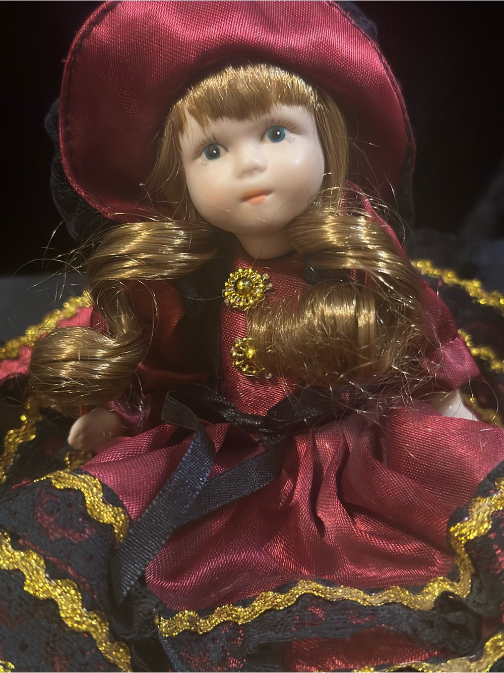 Porcelain Collectible Doll in Burgundy and Black